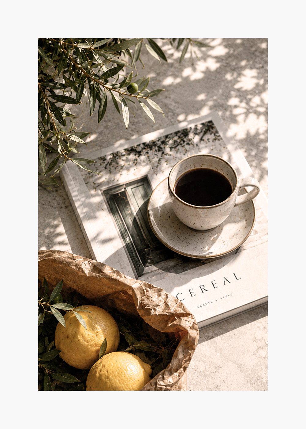 Morning in the Mediterranean Poster med citroner, kaffekopp och olivkvistar på köksbord, perfekt för sommarinredning.